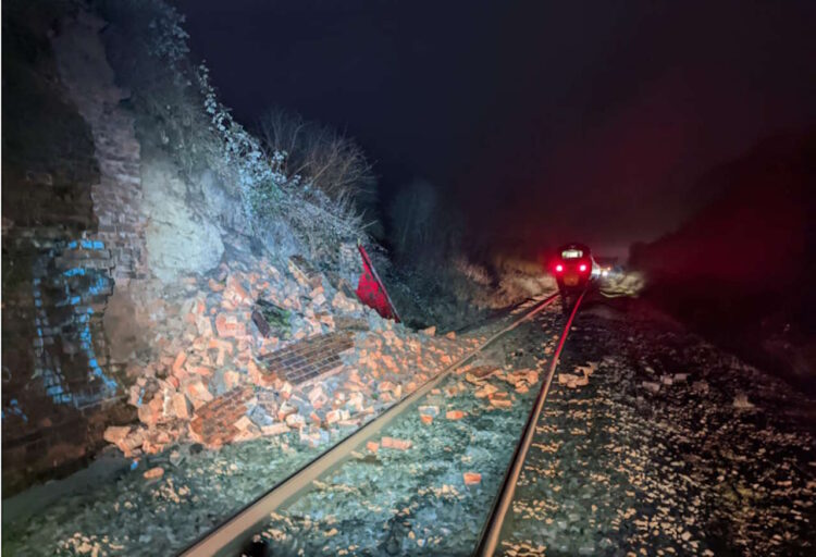 Debris and rear of the stationary train soon after the accident. // Credit: Network Rail