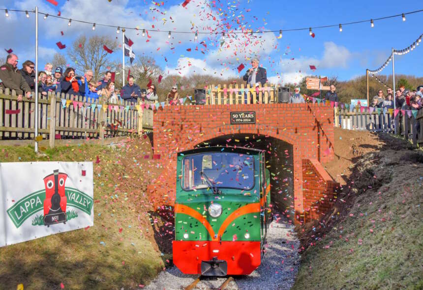 The new locomotive, driven by Operations Manager Ben Harding emerges from the tunnel after the name reveal.
