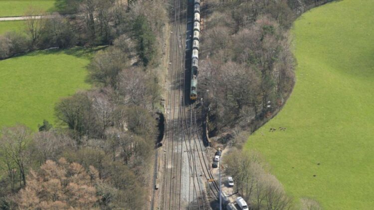 A freight train passing over Bowden Lane Bridge - Network Rail