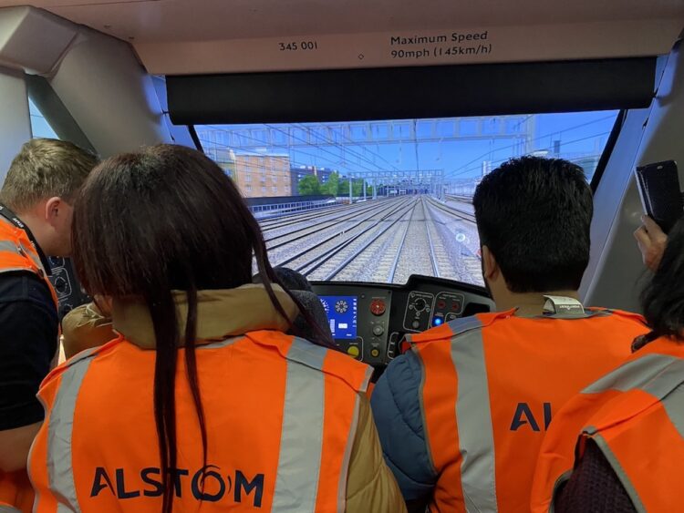 Pupils from Ealing SEND Hub experiencing the simulator at Alstom's Old Oak Common dept