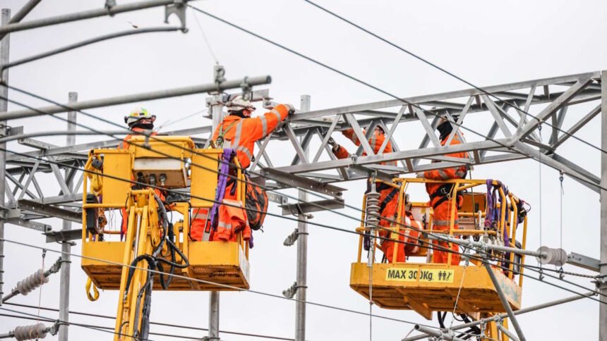 Overhead wires being installed. // Credit: Network Rail
