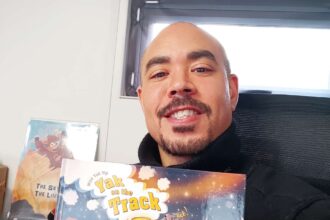 Uncle Brow Brows with his latest railway-themed children's book