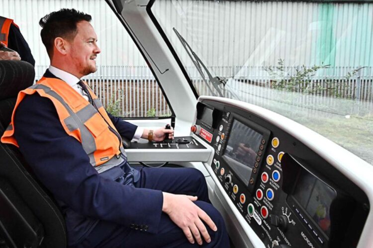 Shadow Rail Minister Stephan Morgan at the controls of the VLR car. - BIMCO