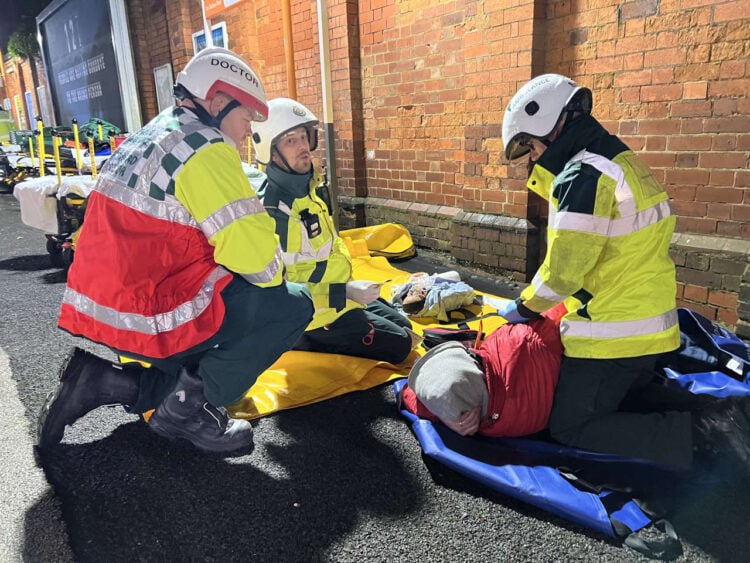st Midlands Ambulance Service attending to a 'patient' as part of 'Royal Oak' incident exercise at Sutton Coldfield stations. // Credit: Network Rail