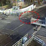 van damaging level crossing barrier March 24