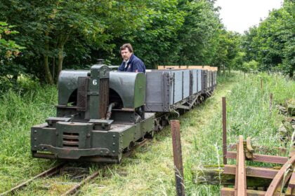 about to return to the task they were built for 108 years ago during World War One, transporting materials across muddy, rain-soaked ground  – trench railway wagons restored by the Lincolnshire Coast Light Railway Historic Vehicles Trust, will take construction materials to the site of the new station . Photos credit : Dave Enefer/LCLR