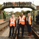 From left: Pat Butler, Signal & Telegraph Manager; Lord Kamall, and Rebecca Dalley, CEO of The Watercress Line, at Medstead and Four Marks station. Photo: Russell Sach.