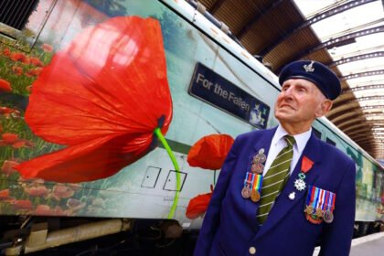 D Day veteran Ken Cookewith CLass 91 Locomotive "For the Fallen". // Credit: London North Eastern Railway